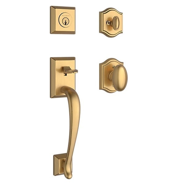 The Baldwin Reserve Napa Handleset with Interior Ellipse Knob with Traditional Arch Rosette in Lifetime Satin Brass finish.