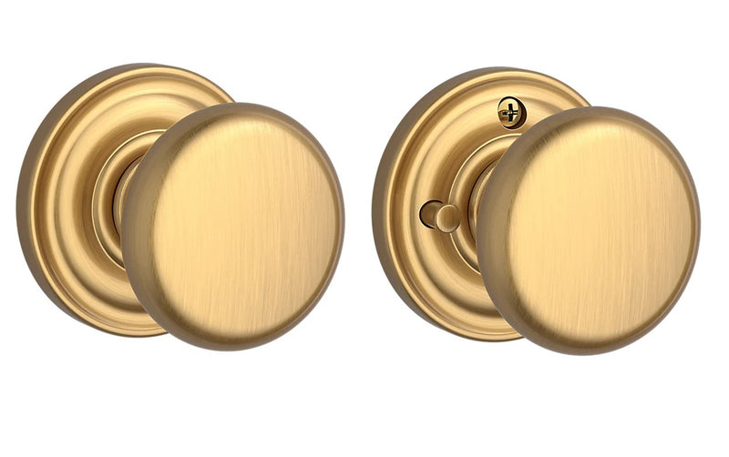 The Baldwin Reserve Round Knob with Traditional Round Rosette in Lifetime Satin Brass finish.