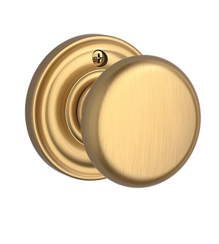 The Baldwin Reserve Round Knob with Traditional Round Rosette in Lifetime Satin Brass finish.