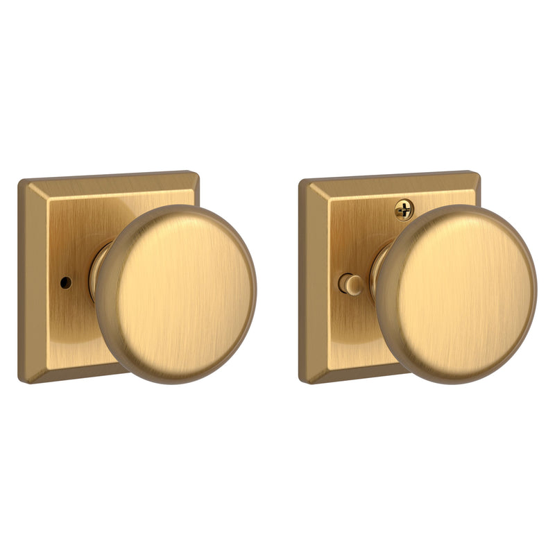 The Baldwin Reserve Round Knob with Traditional Square Rosette in Lifetime Satin Brass finish.