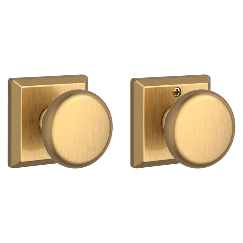 The Baldwin Reserve Round Knob with Traditional Square Rosette in Lifetime Satin Brass finish.