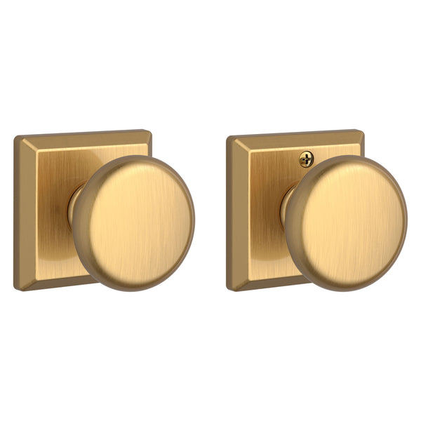 The Baldwin Reserve Round Knob with Traditional Square Rosette in Lifetime Satin Brass finish.