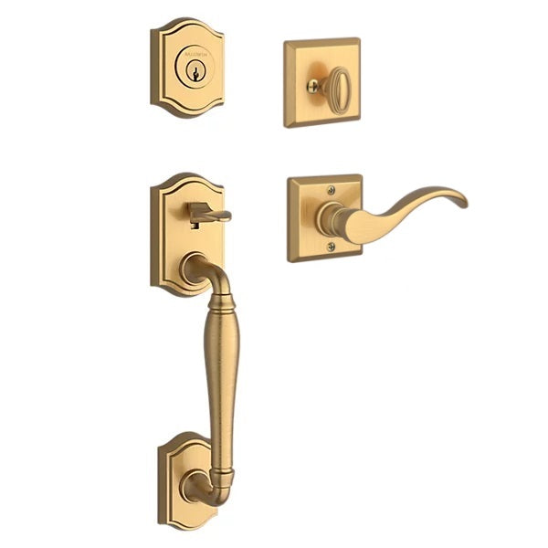 The Baldwin Reserve Westcliff Handleset with Interior Curve Lever with Traditional Square Rosette in Lifetime Satin Brass finish.