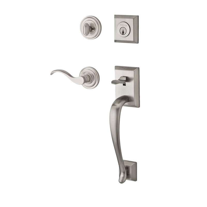 The Baldwin Reserve Napa Handleset with Interior Curve Lever with Traditional Round Rosette in Lifetime Satin Nickel finish.