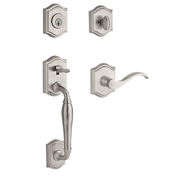 The Baldwin Reserve Westcliff Handleset with Interior Curve Lever with Traditional Arch Rosette in Lifetime Satin Nickel finish.