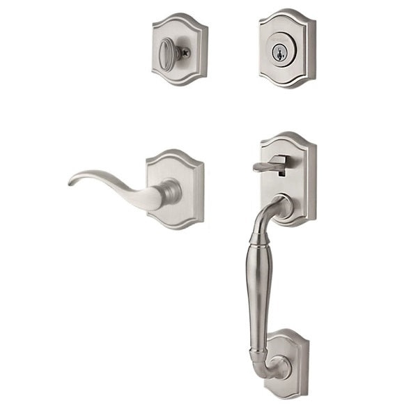 The Baldwin Reserve Westcliff Handleset with Interior Curve Lever with Traditional Arch Rosette in Lifetime Satin Nickel finish.