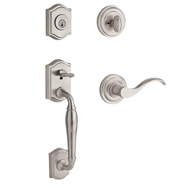 The Baldwin Reserve Westcliff Handleset with Interior Curve Lever with Traditional Round Rosette in Lifetime Satin Nickel finish.