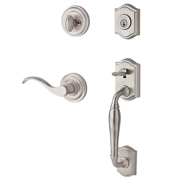 The Baldwin Reserve Westcliff Handleset with Interior Curve Lever with Traditional Round Rosette in Lifetime Satin Nickel finish.