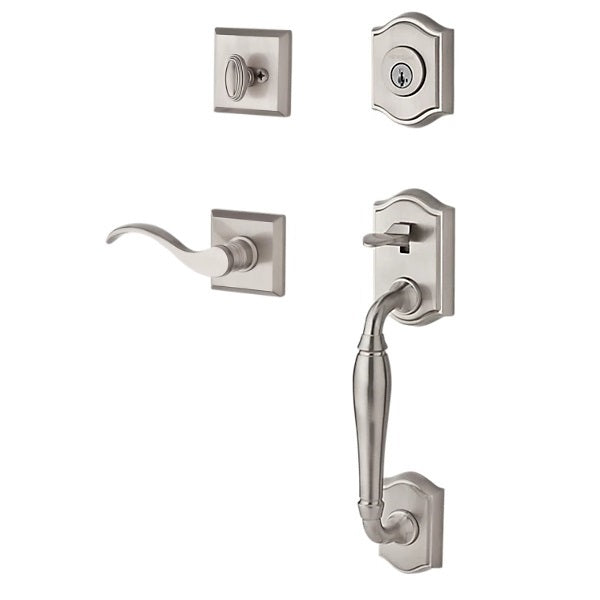 The Baldwin Reserve Westcliff Handleset with Interior Curve Lever with Traditional Square Rosette in Lifetime Satin Nickel finish.