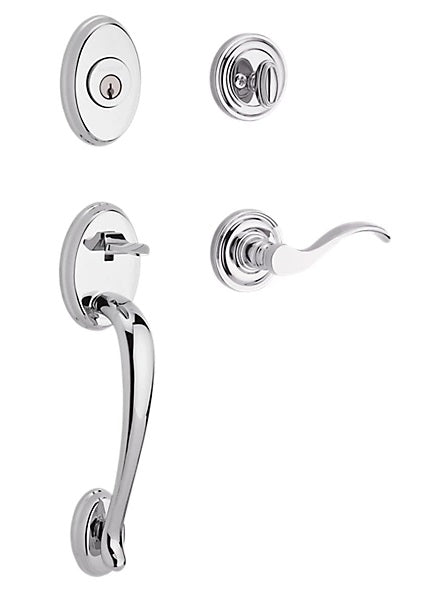 The Baldwin Reserve Columbus Handleset with Interior Curve Lever with Traditional Round Rosette in Polished Chrome finish.