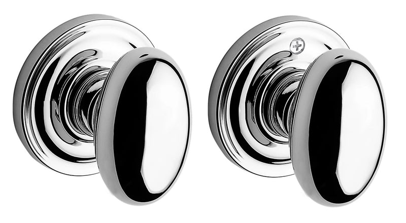 The Baldwin Reserve Ellipse Knob with Traditional Round Rosette in Polished Chrome finish.