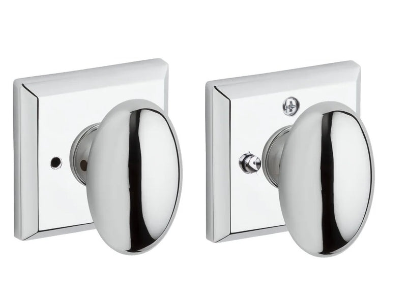 The Baldwin Reserve Ellipse Knob with Traditional Square Rosette in Polished Chrome finish.