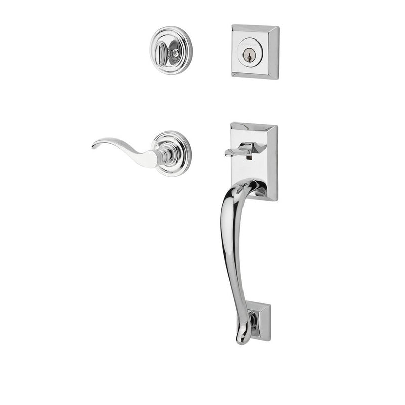 The Baldwin Reserve Napa Handleset with Interior Curve Lever with Traditional Round Rosette in Polished Chrome finish.