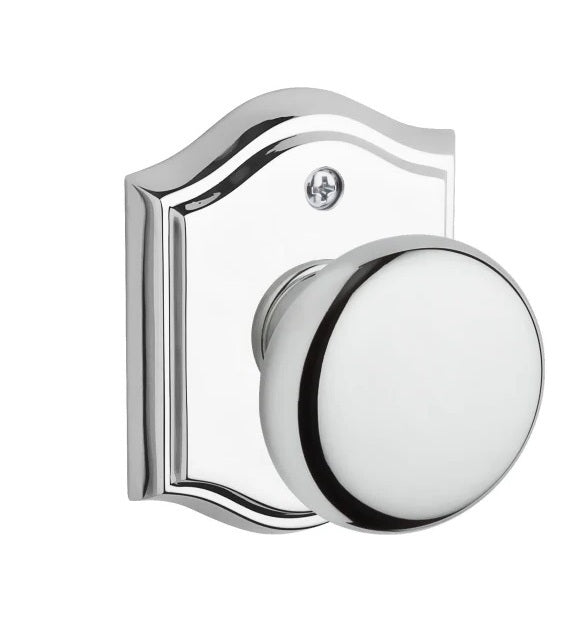 The Baldwin Reserve Round Knob with Traditional Arch Rosette in Polished Chrome finish.