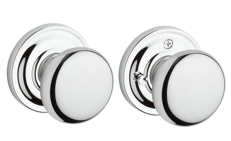 The Baldwin Reserve Round Knob with Traditional Round Rosette in Polished Chrome finish.
