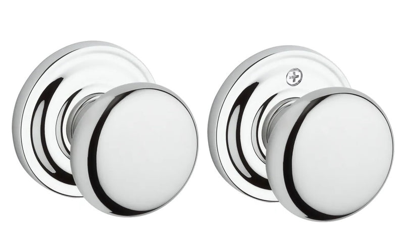 The Baldwin Reserve Round Knob with Traditional Round Rosette in Polished Chrome finish.