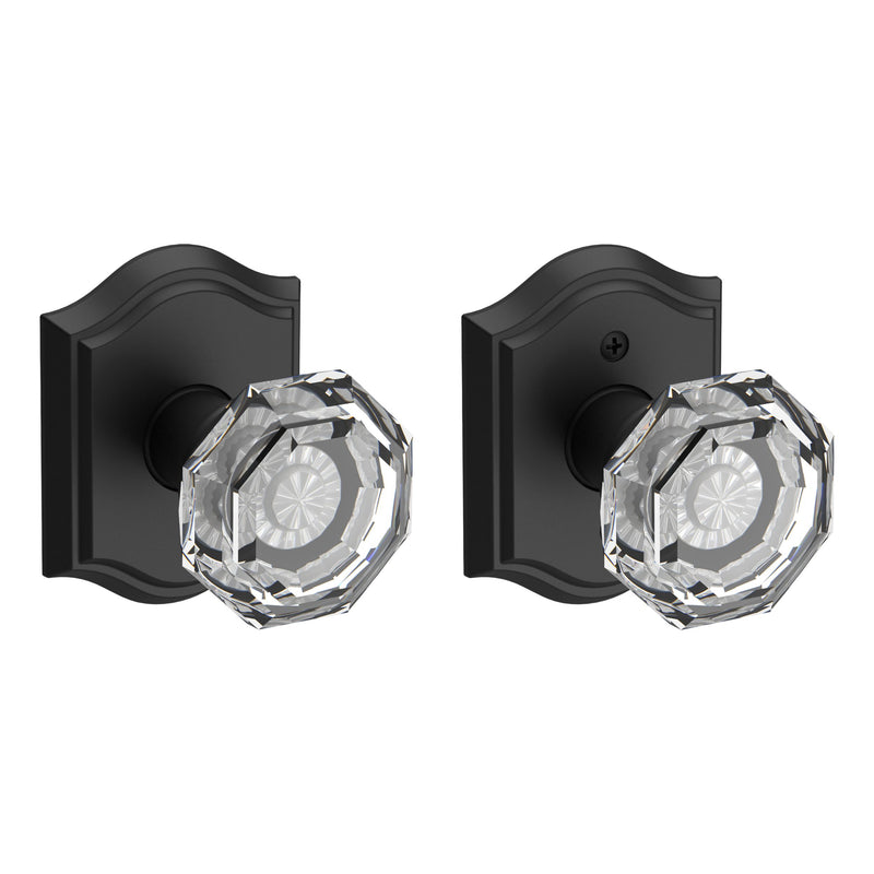 The Baldwin Reserve Crystal Knob with Traditional Arch Rosette in Satin Black finish.