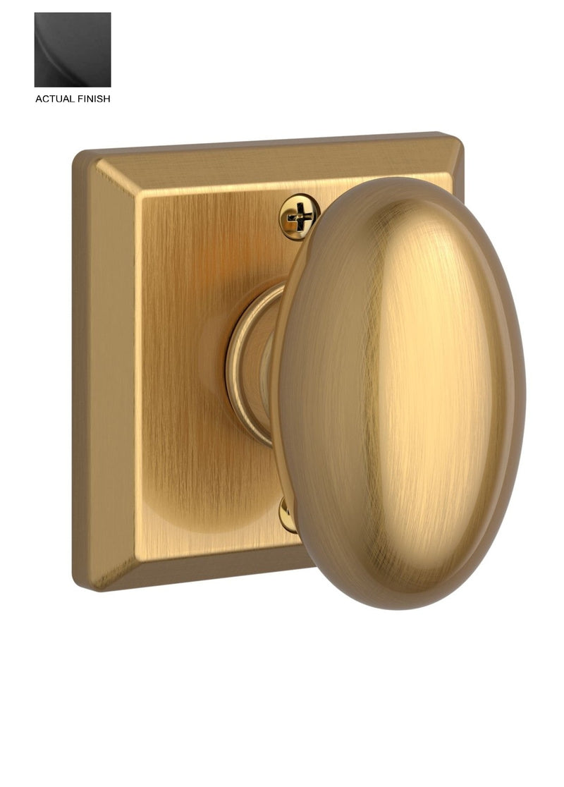 The Baldwin Reserve Ellipse Knob with Traditional Square Rosette in Satin Black finish.