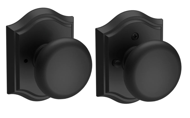 The Baldwin Reserve Round Knob with Traditional Arch Rosette in Satin Black finish.