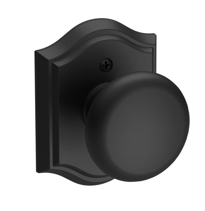 The Baldwin Reserve Round Knob with Traditional Arch Rosette in Satin Black finish.