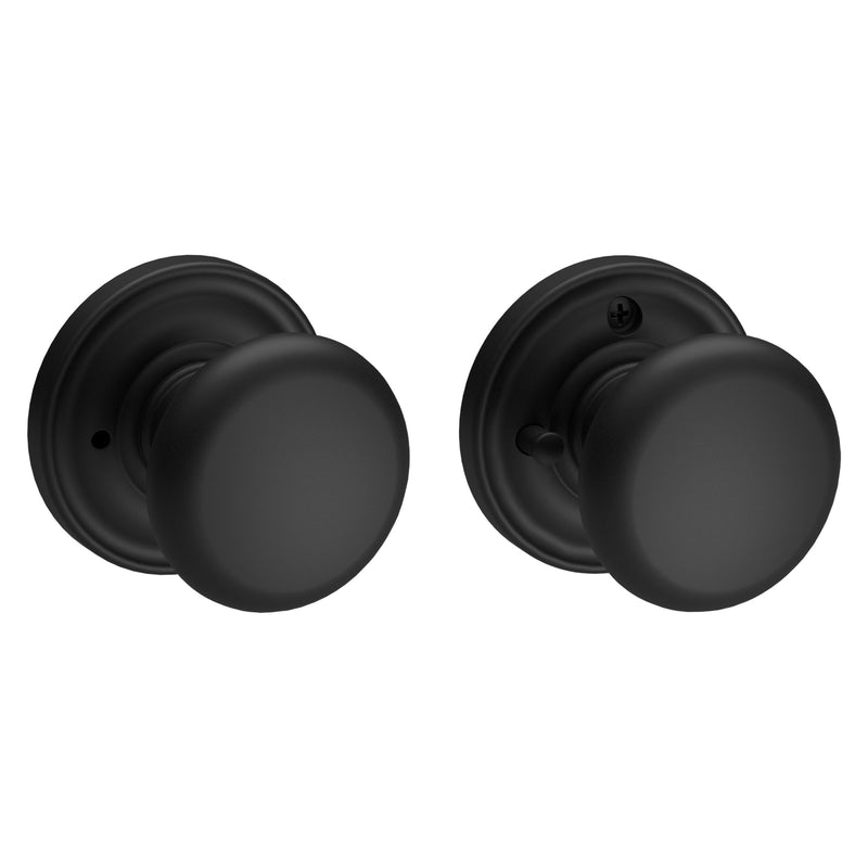 The Baldwin Reserve Round Knob with Traditional Round Rosette in Satin Black finish.