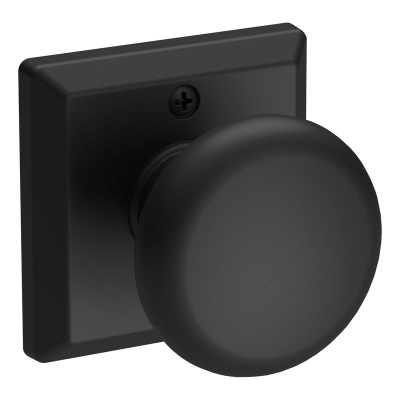 The Baldwin Reserve Round Knob with Traditional Square Rosette in Satin Black finish.