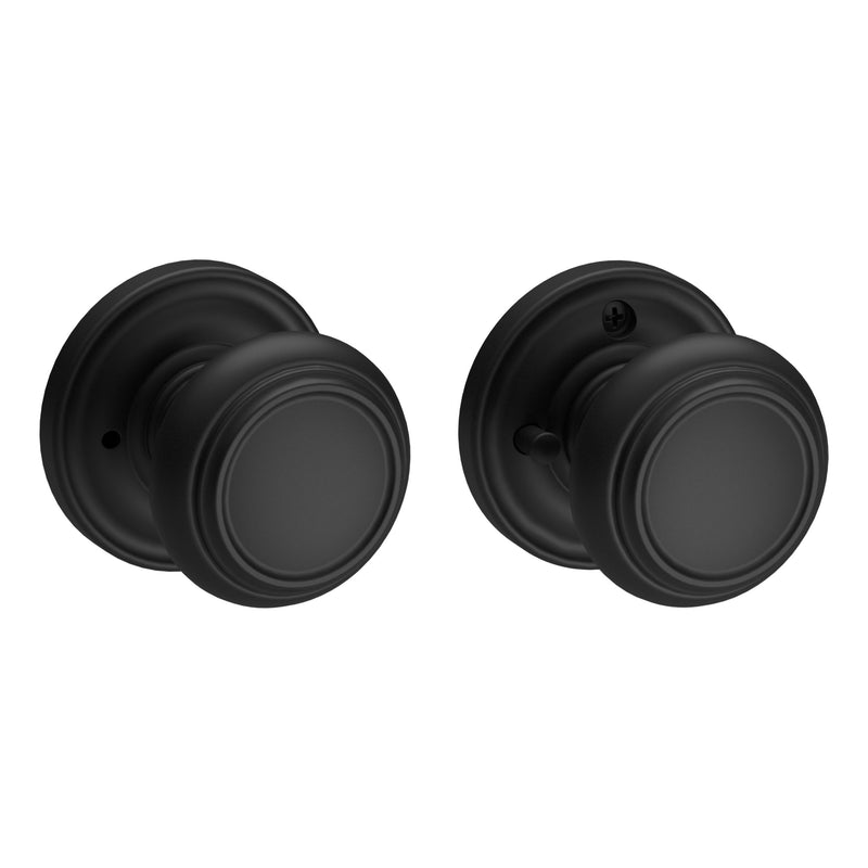 The Baldwin Reserve Traditional Knob with Traditional Round Rosette in Satin Black finish.