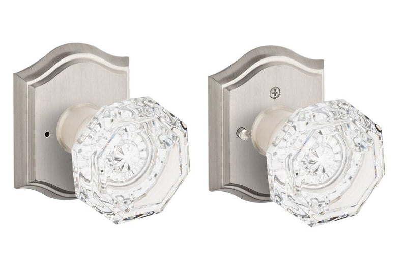 The Baldwin Reserve Crystal Knob with Traditional Arch Rosette in Satin Nickel finish.