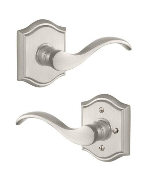 The Baldwin Reserve Curve Lever with Traditional Arch Rosette in Satin Nickel finish.