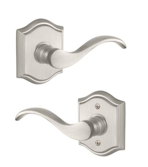 The Baldwin Reserve Curve Lever with Traditional Arch Rosette in Satin Nickel finish.