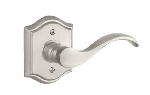 The Baldwin Reserve Curve Lever with Traditional Arch Rosette in Satin Nickel finish.