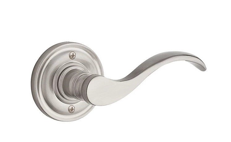 The Baldwin Reserve Curve Lever with Traditional Round Rosette in Satin Nickel finish.