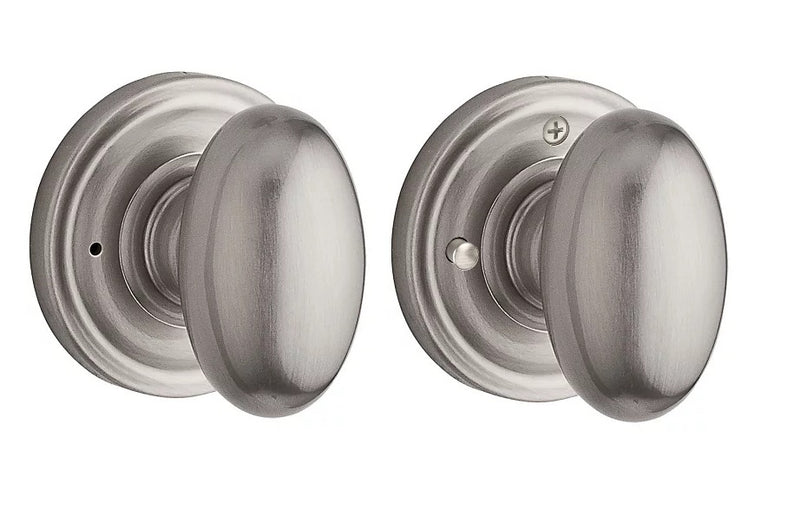 The Baldwin Reserve Ellipse Knob with Traditional Round Rosette in Satin Nickel finish.