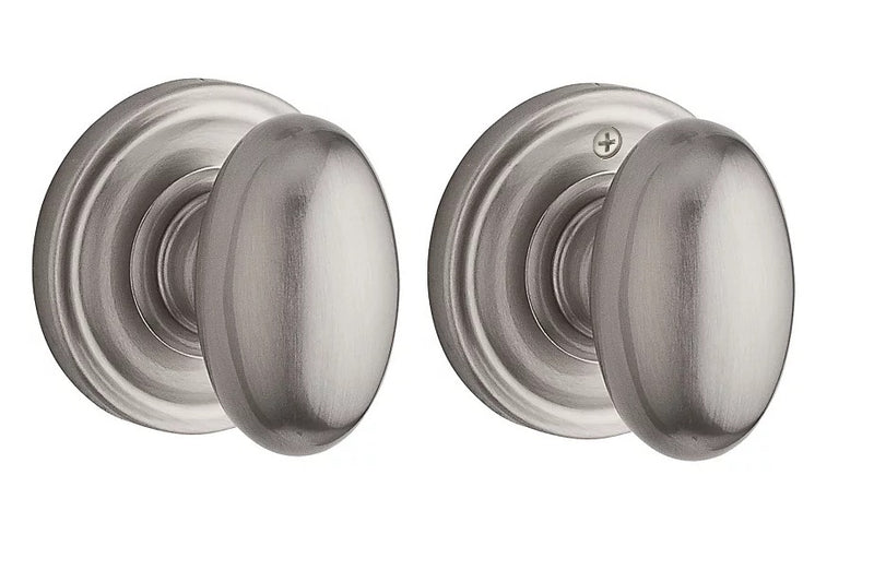 The Baldwin Reserve Ellipse Knob with Traditional Round Rosette in Satin Nickel finish.