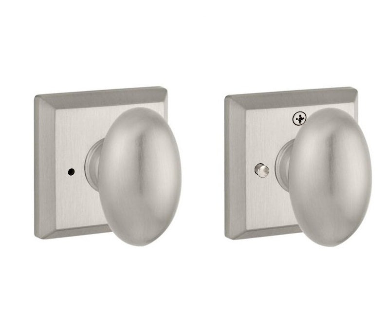 The Baldwin Reserve Ellipse Knob with Traditional Square Rosette in Satin Nickel finish.