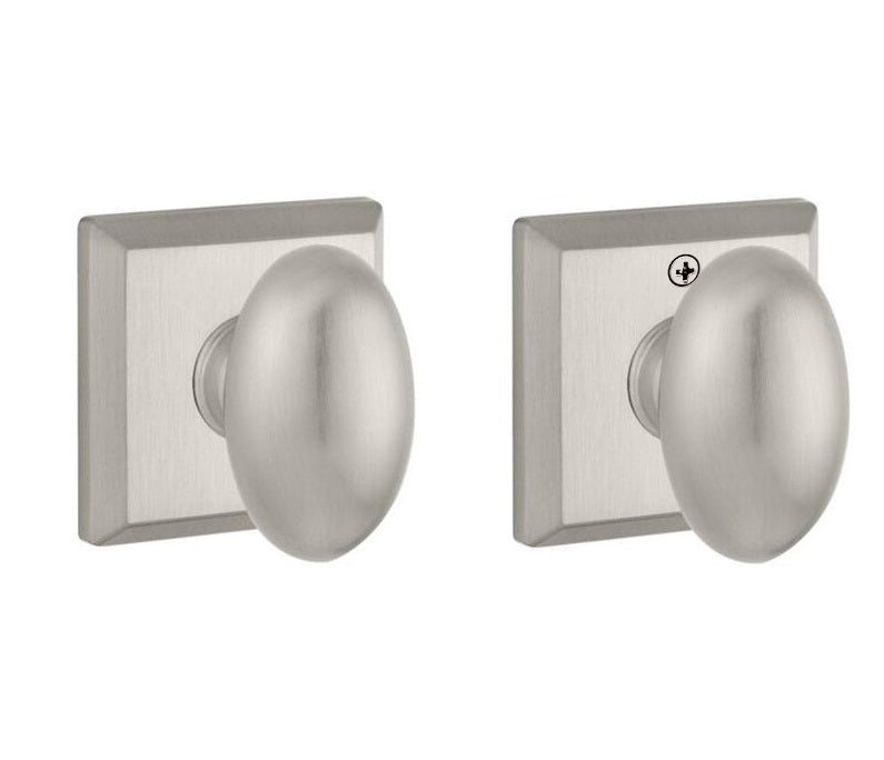 The Baldwin Reserve Ellipse Knob with Traditional Square Rosette in Satin Nickel finish.