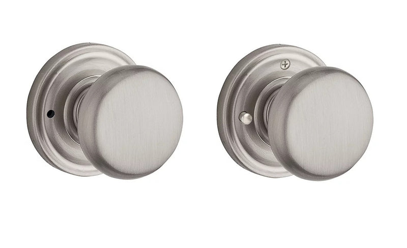 The Baldwin Reserve Round Knob with Traditional Round Rosette in Satin Nickel finish.