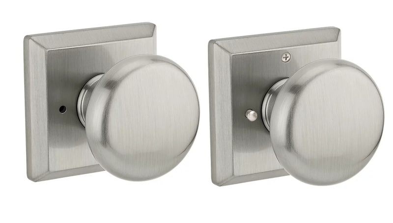 The Baldwin Reserve Round Knob with Traditional Square Rosette in Satin Nickel finish.