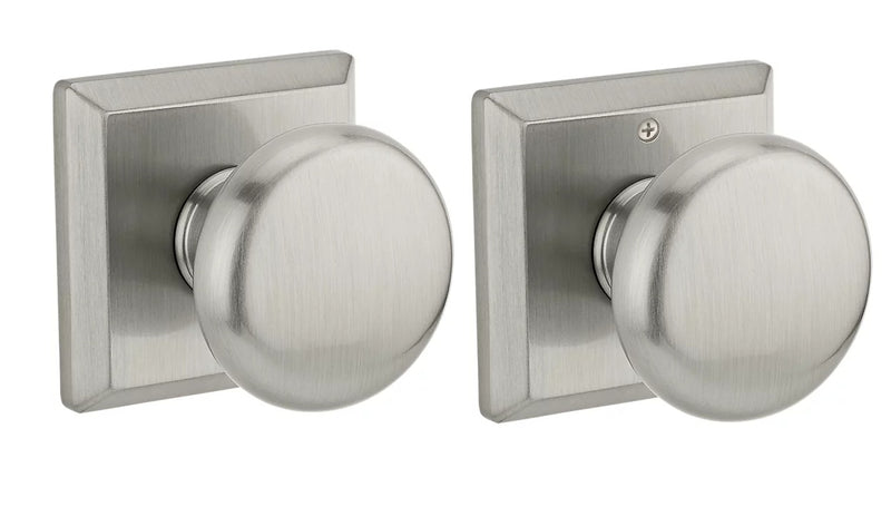 The Baldwin Reserve Round Knob with Traditional Square Rosette in Satin Nickel finish.