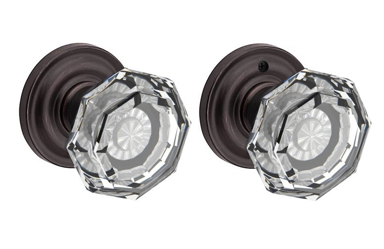 The Baldwin Reserve Crystal Knob with Traditional Round Rosette in Venetian Bronze finish.