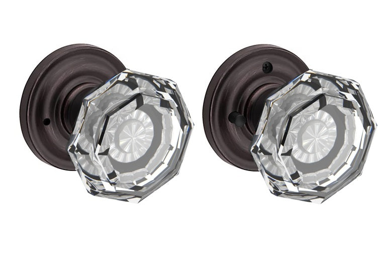 The Baldwin Reserve Crystal Knob with Traditional Round Rosette in Venetian Bronze finish.