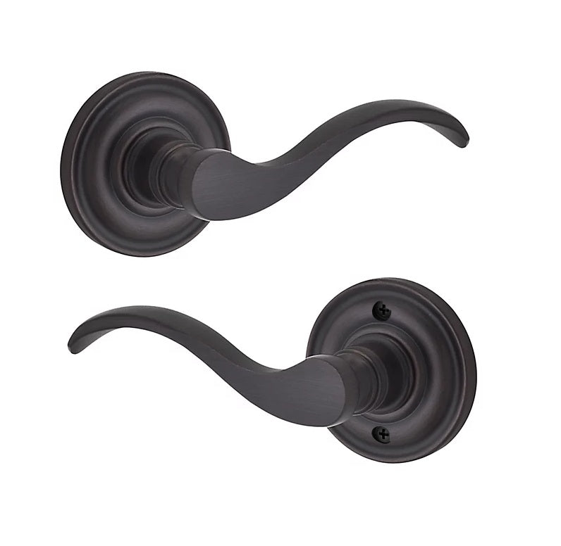 The Baldwin Reserve Curve Lever with Traditional Round Rosette in Venetian Bronze finish.