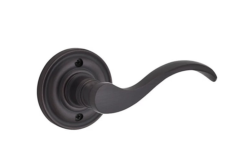 The Baldwin Reserve Curve Lever with Traditional Round Rosette in Venetian Bronze finish.