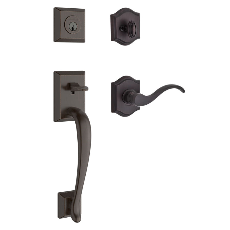 The Baldwin Reserve Napa Handleset with Interior Curve Lever with Traditional Arch Rosette in Venetian Bronze finish.