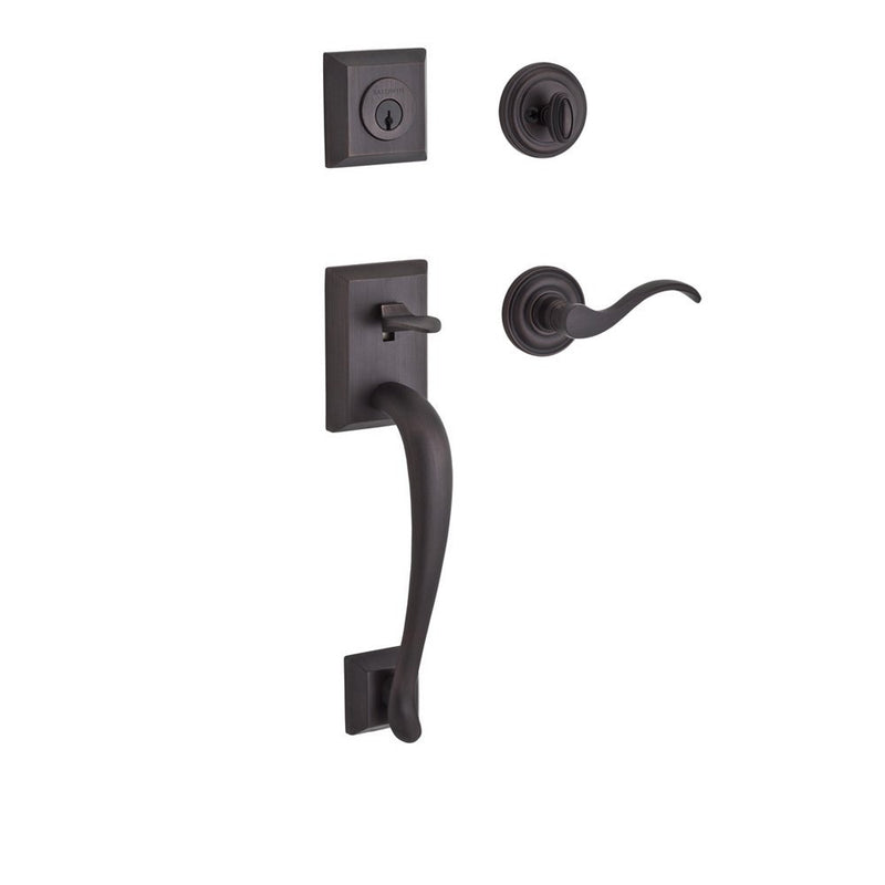 The Baldwin Reserve Napa Handleset with Interior Curve Lever with Traditional Round Rosette in Venetian Bronze finish.