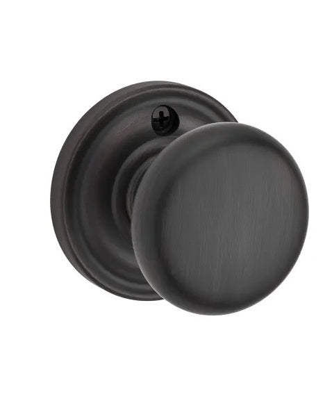 The Baldwin Reserve Round Knob with Traditional Round Rosette in Venetian Bronze finish.