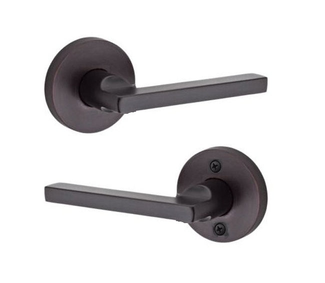 The Baldwin Reserve Square Lever with Contemporary Round Rosette in Venetian Bronze finish.