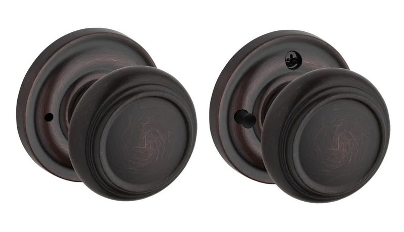 The Baldwin Reserve Traditional Knob with Traditional Round Rosette in Venetian Bronze finish.