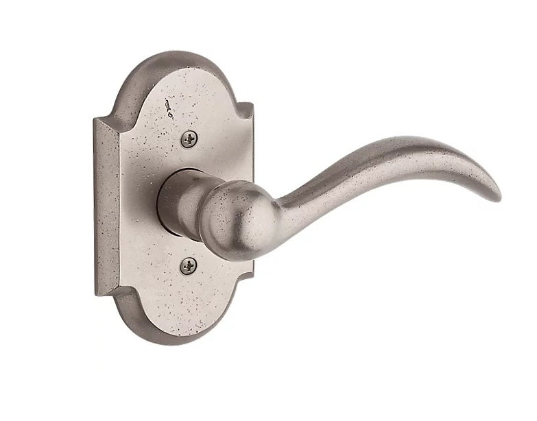 The Baldwin Reserve Arch Lever with Rustic Arch Rosette in White Bronze finish.