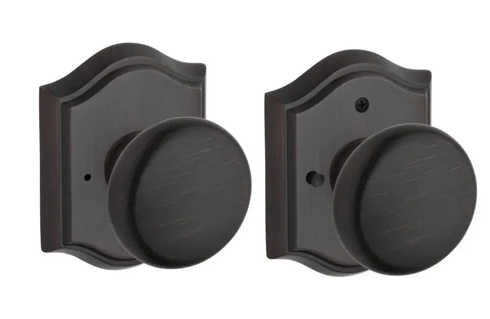 Baldwin Round Knob with Traditional Arch Rosette Venetian Bronze